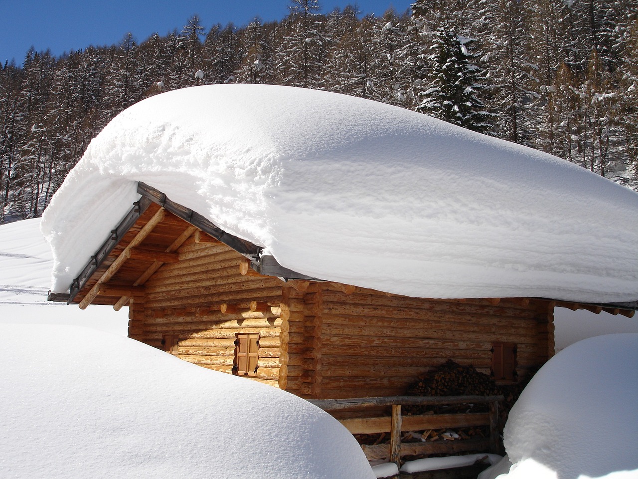 Heavy snow on a hut